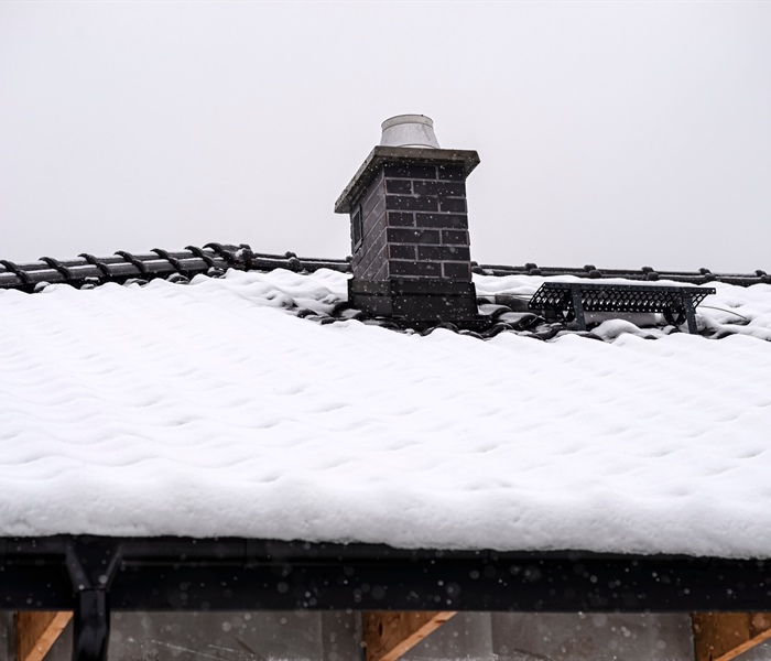 How Heavy Snowfall and Blizzards Damage Your Roof and Home