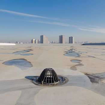 Prevent Flat Roof Drainage Issues on Your Commercial Building