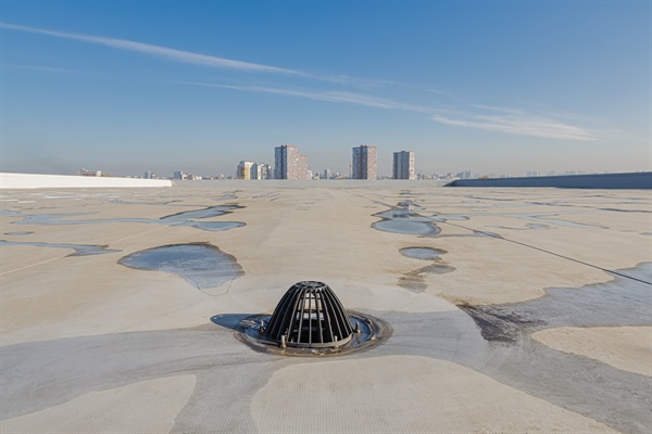Prevent Flat Roof Drainage Issues on Your Commercial Building
