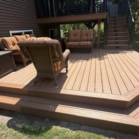 Custom composite deck with outdoor seating area in Cottage Grove