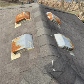 Roof shingles and flashing components staged for installation