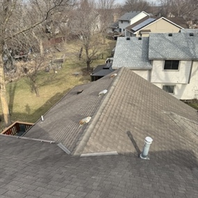 Finished roof with restored flashing and new skylight in Maple Grove
