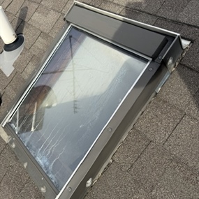 Custom flashing system installed around residential skylight
